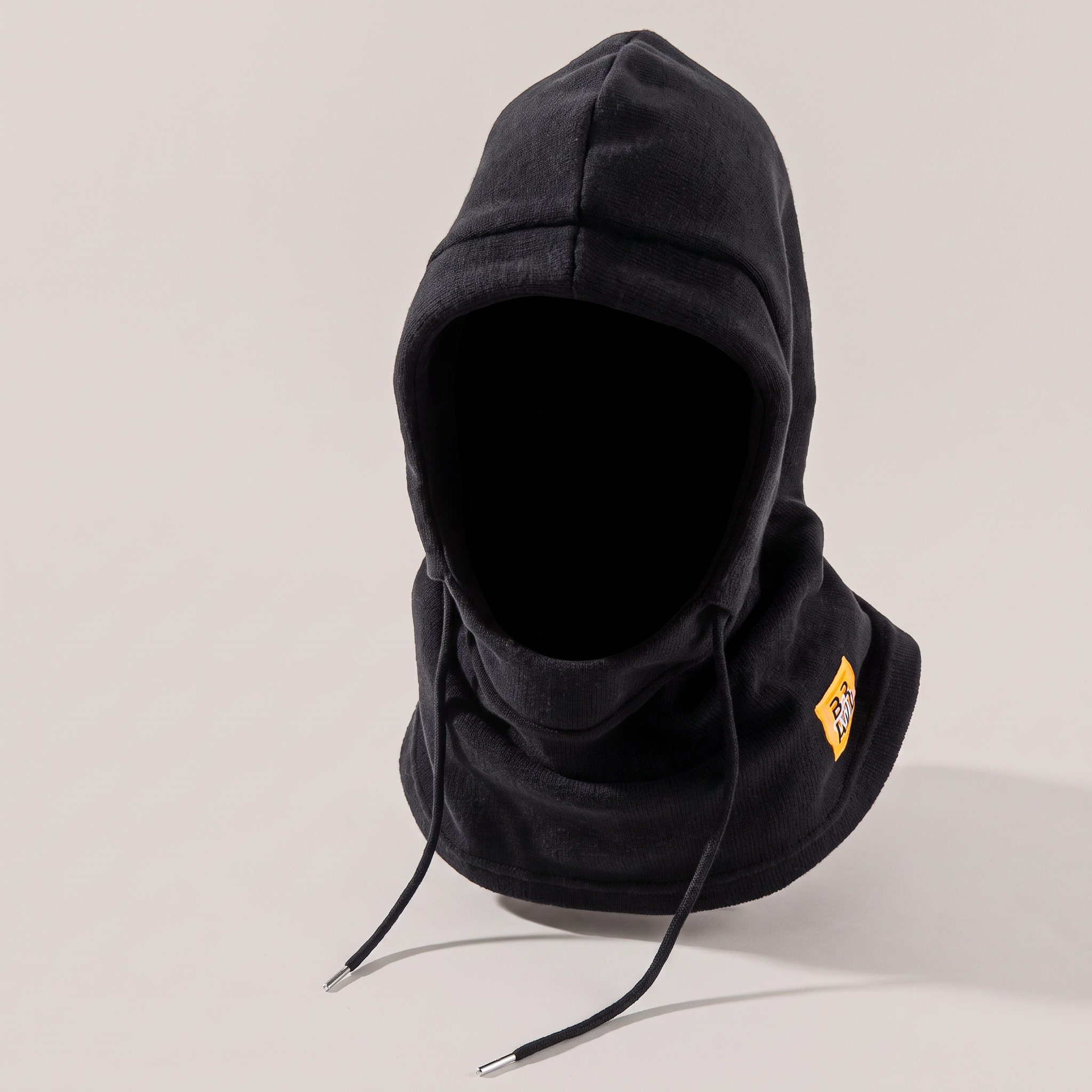 A black knitted hooded hat