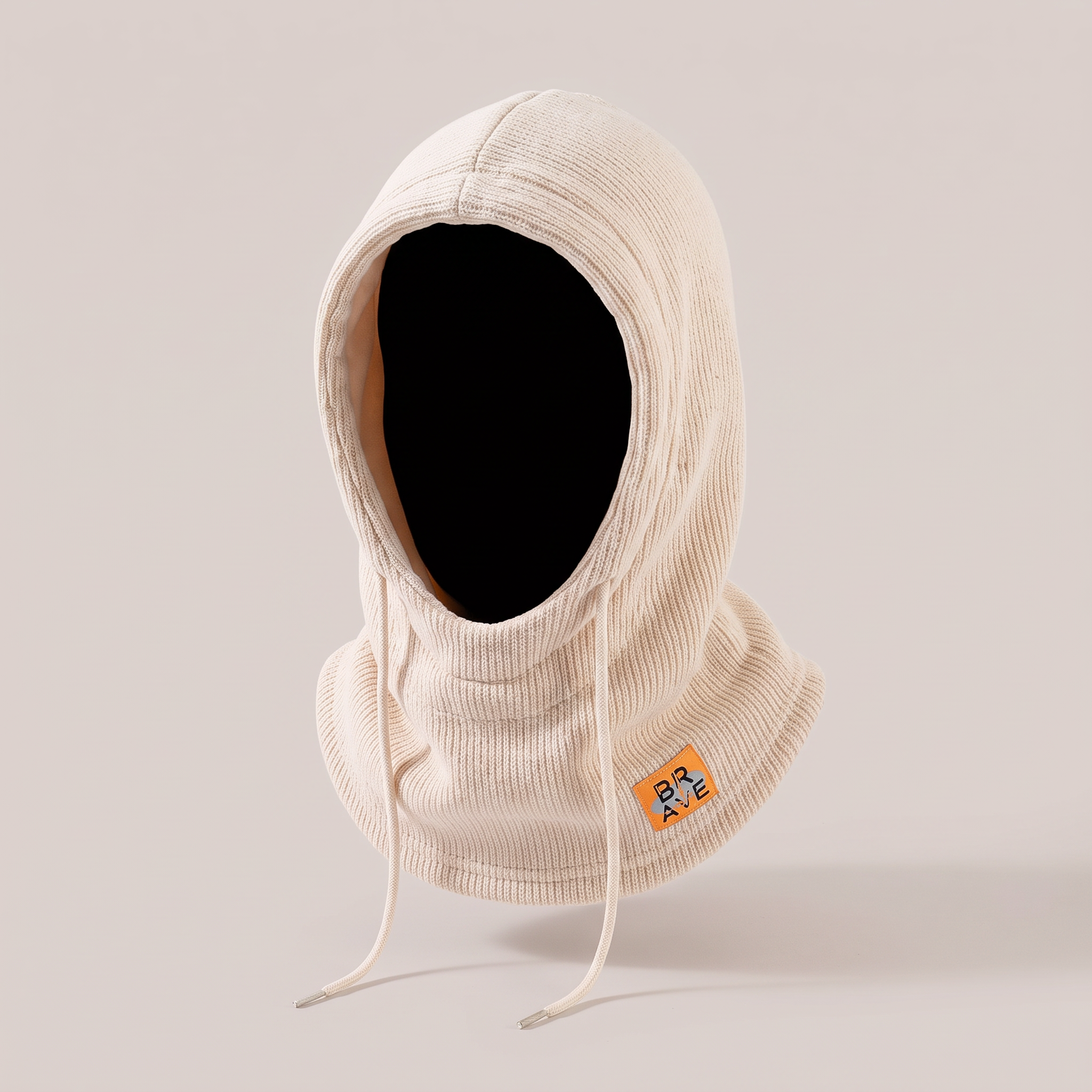 A beige knitted hooded hat