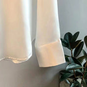 Satijnlook blouse dames met contrastbies en lange mouwen