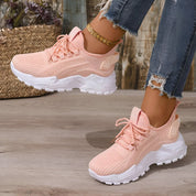 Women's knit trainers with chunky sole and wide toe box in orange