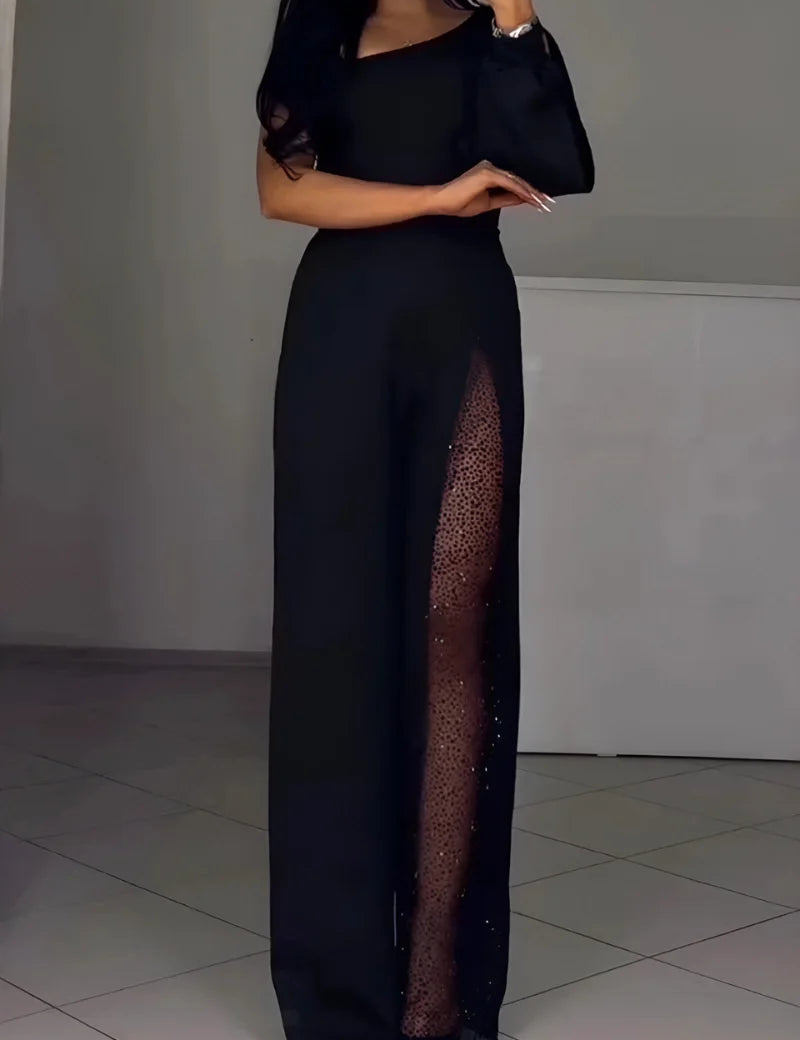Women's off-shoulder jumpsuit in black with sheer wide legs