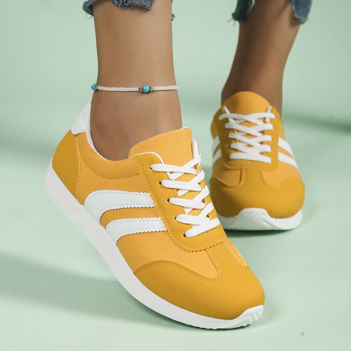 Women's retro trainers with wide toe box and supportive footbed