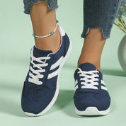Women's retro trainers with wide toe box and supportive footbed in navy