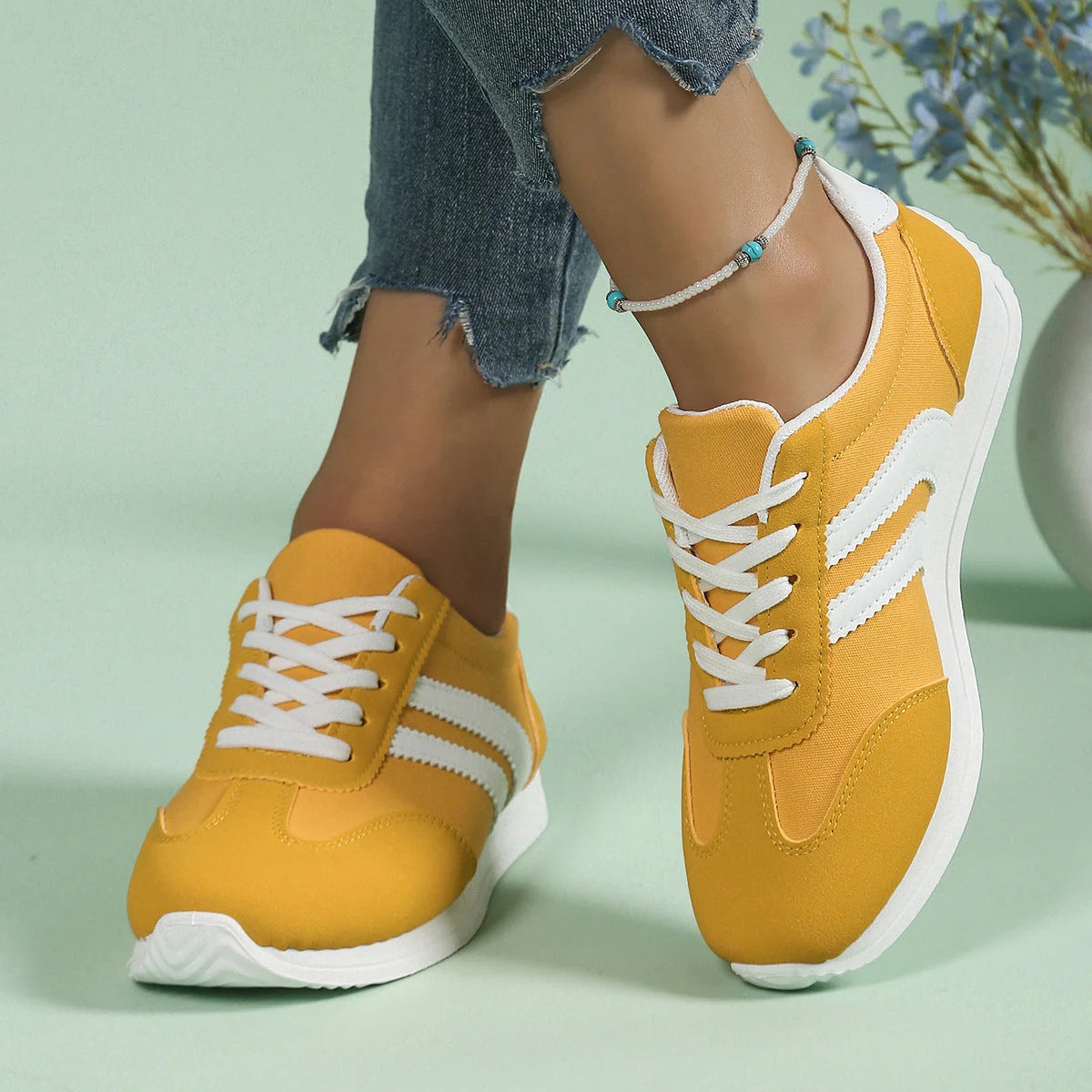 Women's retro trainers with wide toe box and supportive footbed in yellow