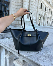 Women's large faux leather tote bag with inner pocket