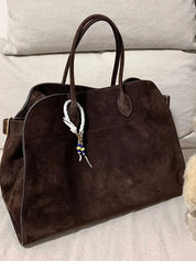 Women's large structured tote bag with adjustable shoulder straps