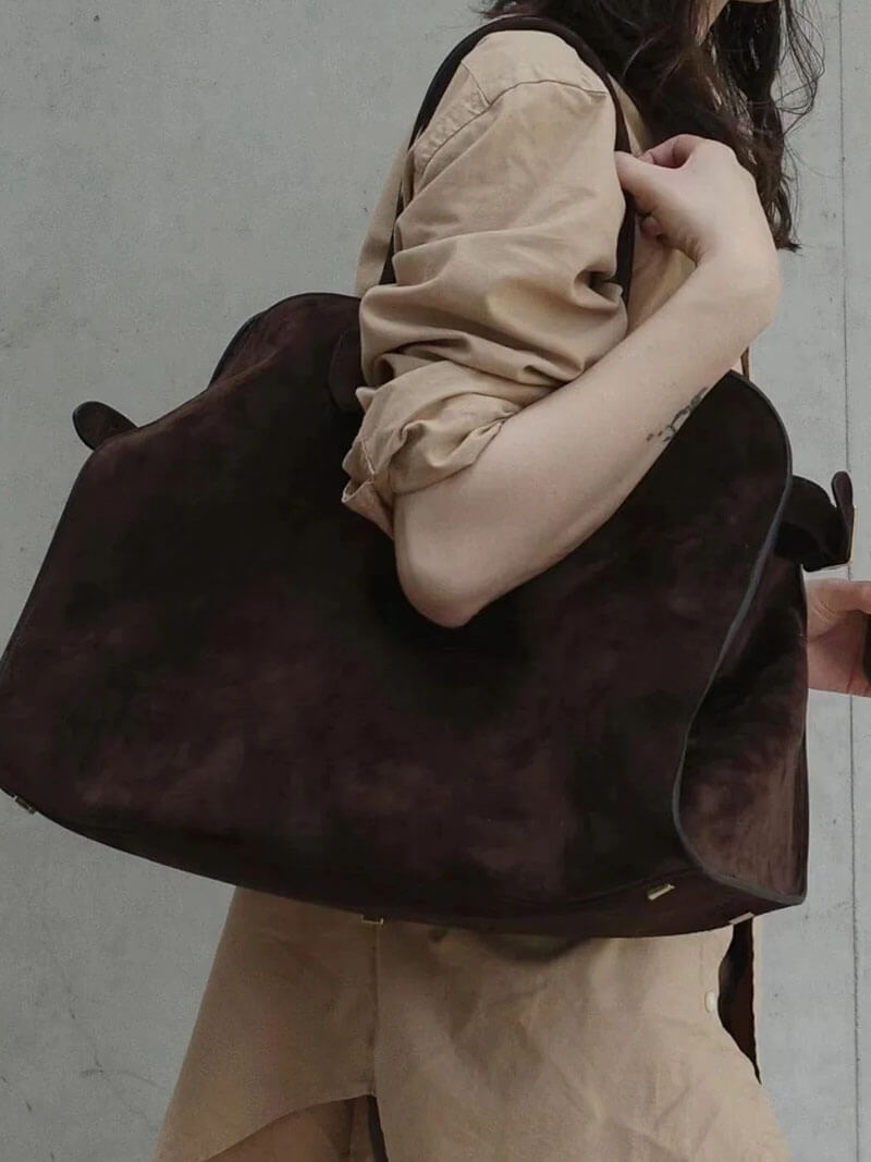 Women's large structured tote bag with adjustable shoulder straps