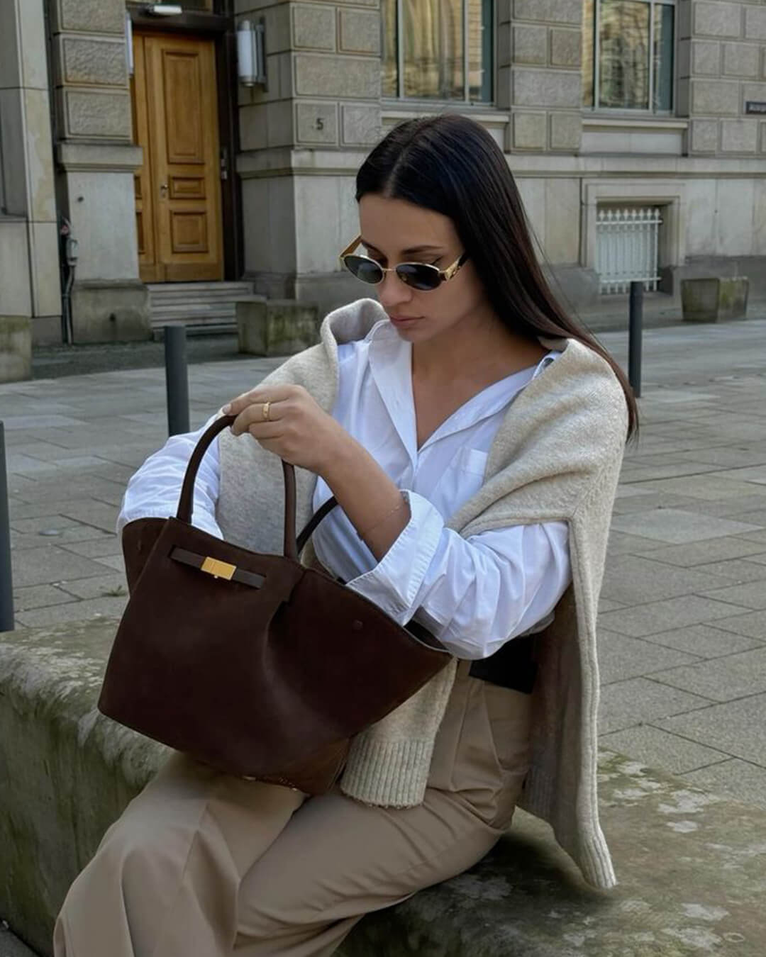 Women's faux suede handbag with gold-tone clasp