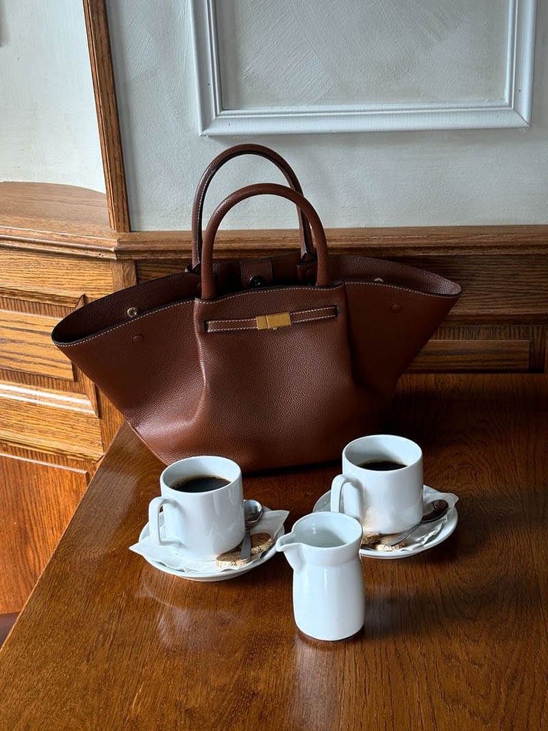 Women's faux leather handbag with adjustable shoulder strap