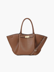 Women's faux leather handbag with adjustable shoulder strap