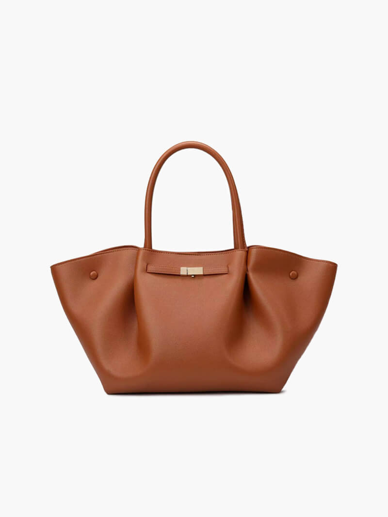 Women's faux leather handbag with adjustable shoulder strap