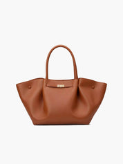 Women's faux leather handbag with adjustable shoulder strap