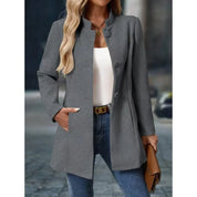 Women's stand collar coat with button front and side pockets in grey