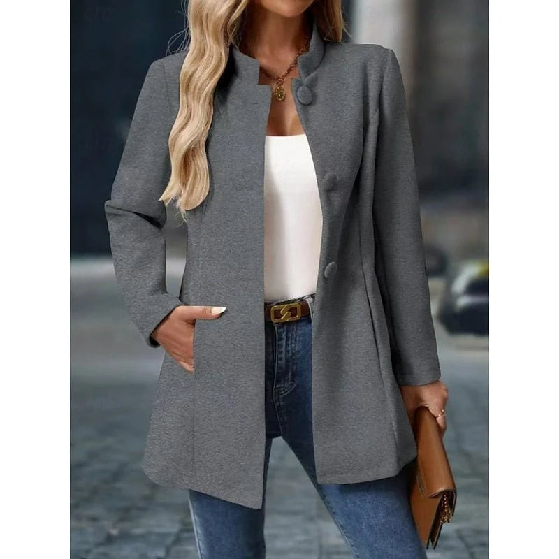 Women's stand collar coat with button front and side pockets in grey