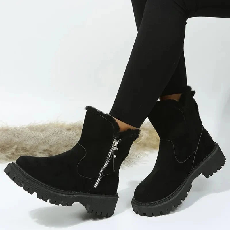 Women's suede-look ankle boots with faux fur trim and side zip in black