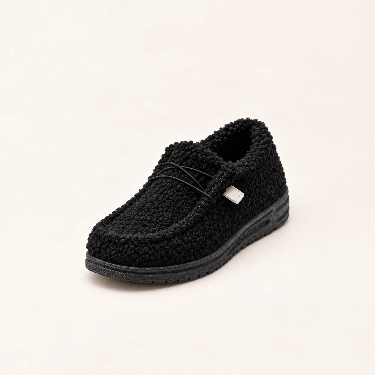 Women's teddy slippers with closed toe and sturdy sole in black