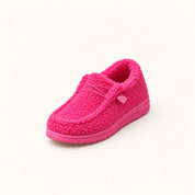 Women's teddy slippers with closed toe and sturdy sole in fuchsia