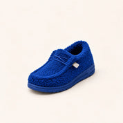 Women's teddy slippers with closed toe and sturdy sole in royal blue