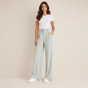 Model in groene wijde pantalon met hoge taille dames, vooraanzicht