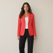 A model wearing a tailored red women's blazer with one button, front view