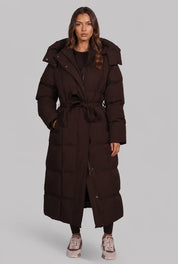 Women's long puffer coat with detachable hood and belt, photo 1