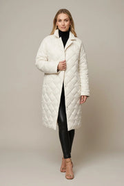 Women's longline quilted puffer jacket with leopard lining