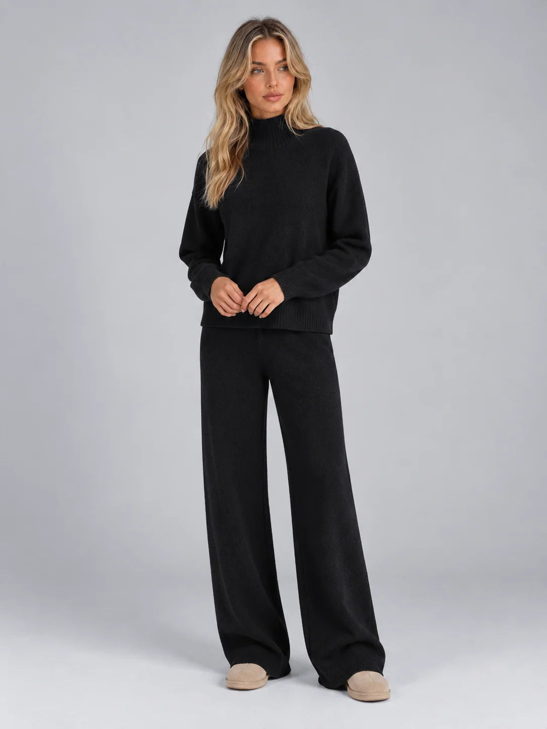 Women's wool co-ord set with roll neck jumper and wide leg trousers in black
