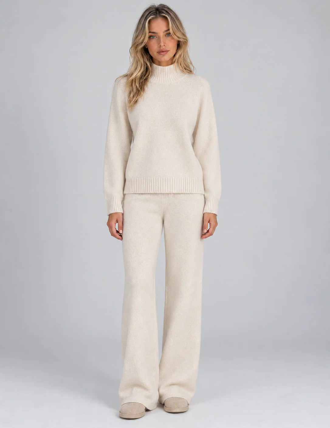 Women's wool co-ord set with roll neck jumper and wide leg trousers in cream