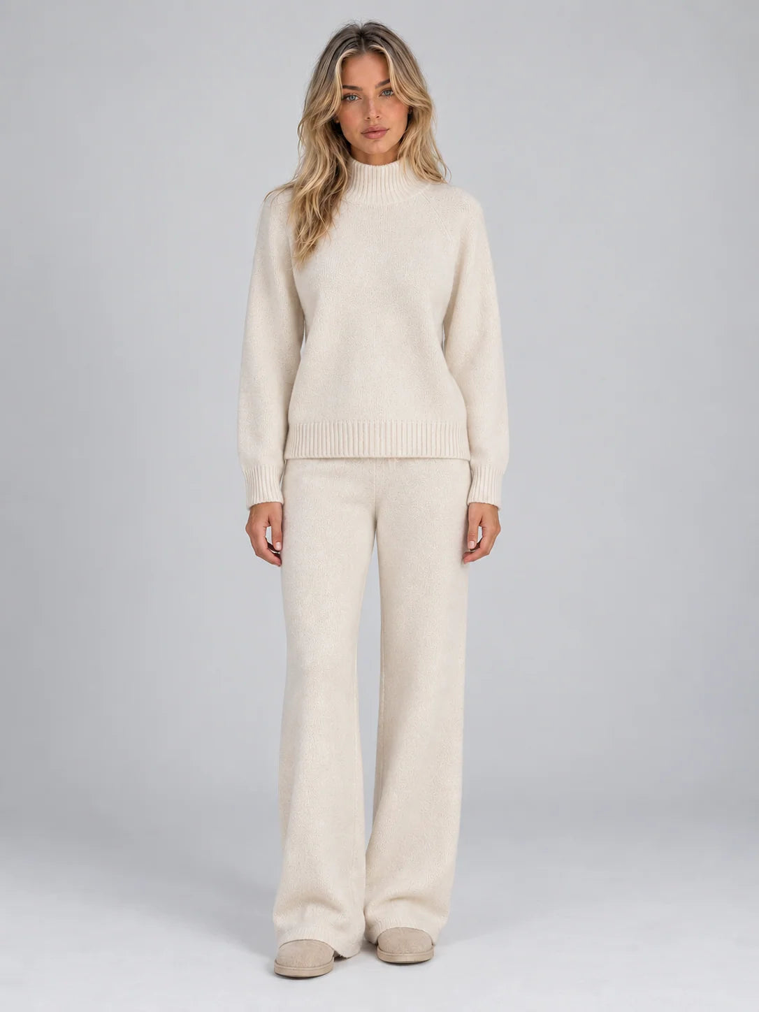 Women's wool co-ord set with roll neck jumper and wide leg trousers in cream